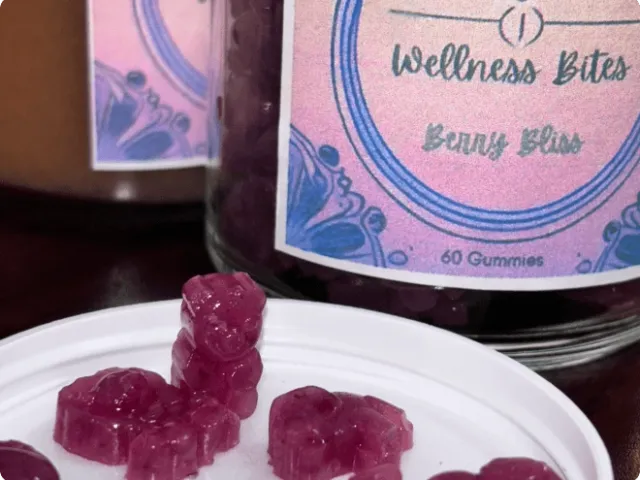 containers with a plate of purple gummies in front