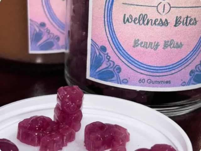 containers with a plate of purple gummies in front