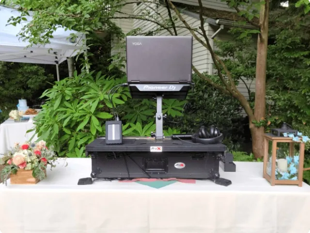 a DJ booth setup at a wedding