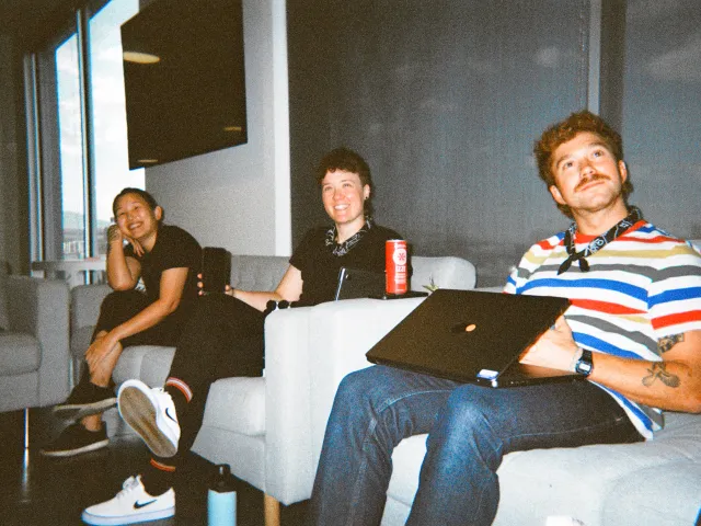 team sitting on a couch
