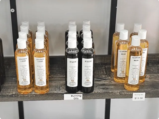 bottles of body oils on a shelf
