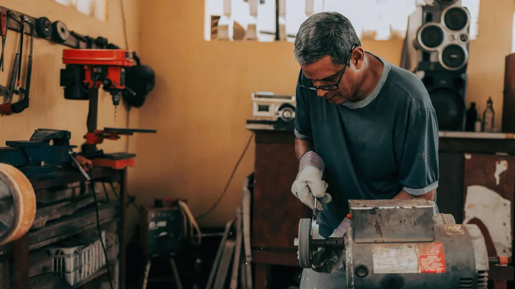 Small business owners work in mechanic shop
