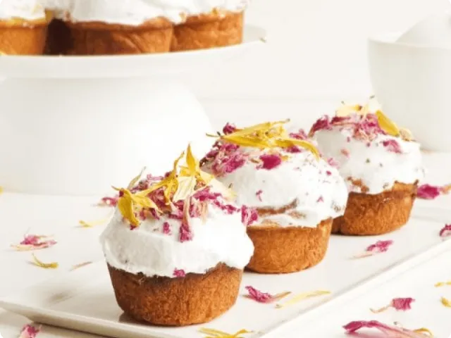 three cupcakes on a plate