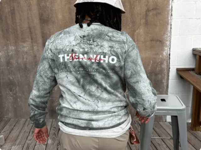 photo of the back of a person wearing a sweater
