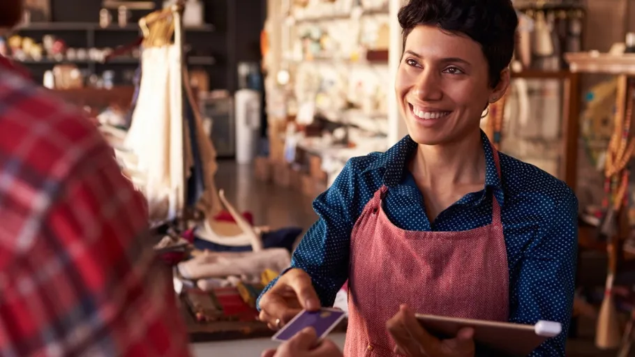 Small business owners uses a Bank of America business credit card for growth.