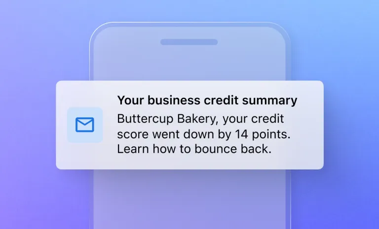 Business credit alert notification showing a 14-point score decrease with guidance to improve credit.