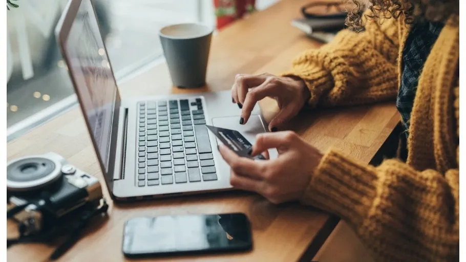 person paying with credit card