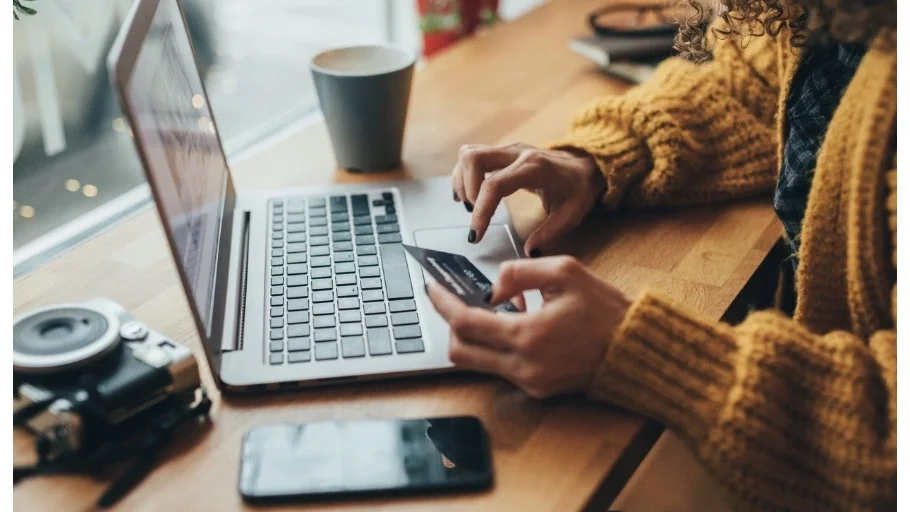 person paying with credit card