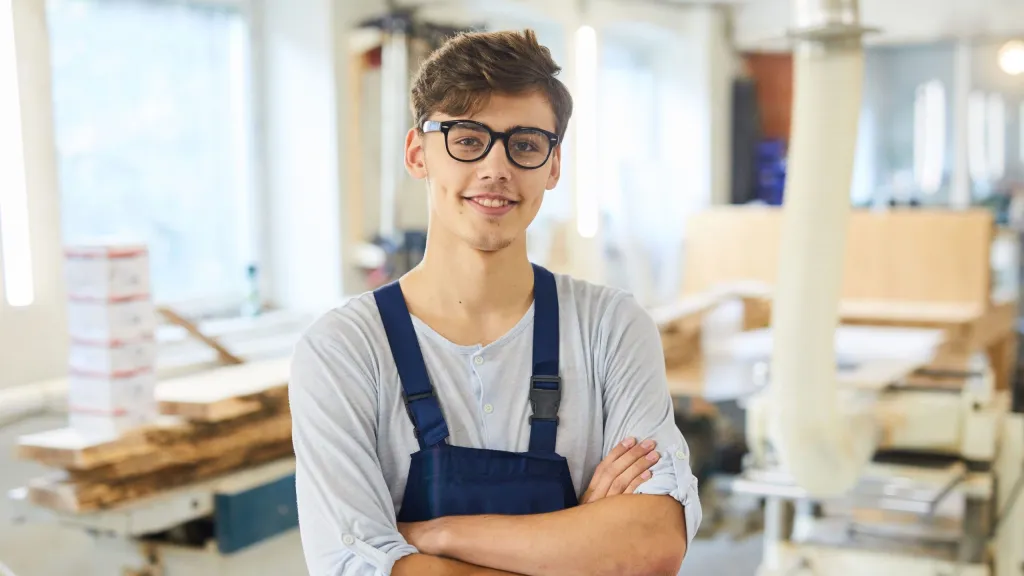 male business owner standing in construction office to illustrate IRS business and NAICS codes article