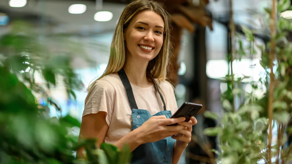 business owner running payroll on phone
