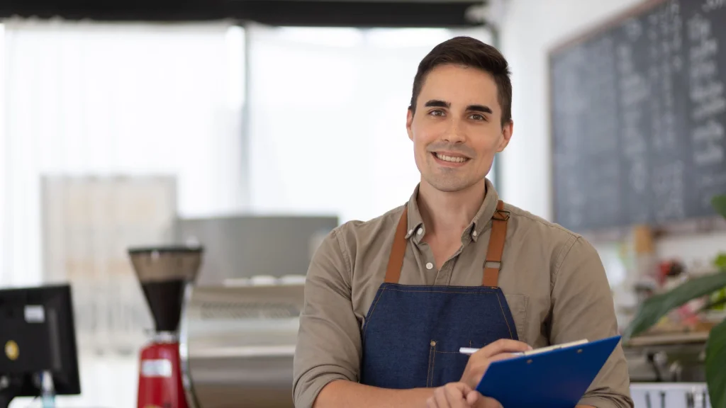 business owner with notebook to illustrate saving money on California taxes