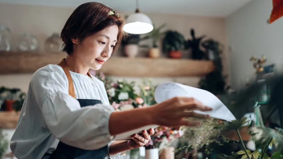 Small business owner learns how to lend money to own business.