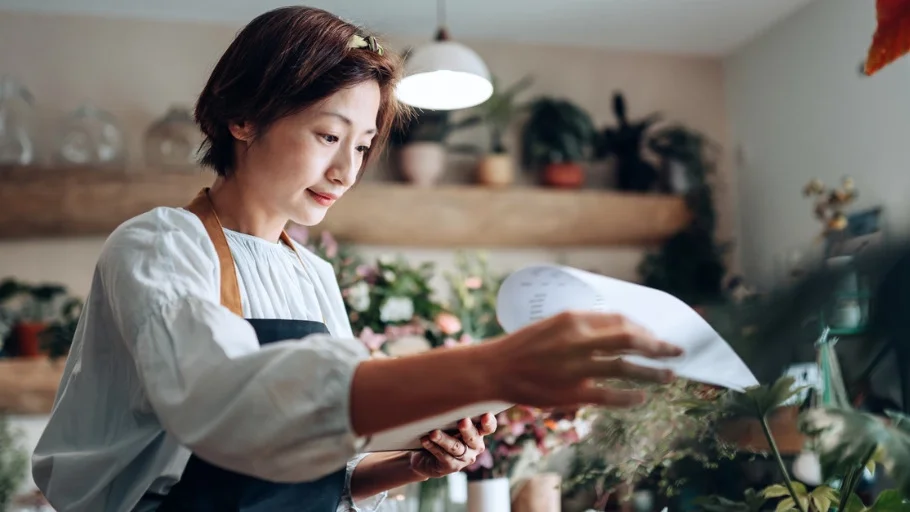 Small business owner learns how to lend money to own business.