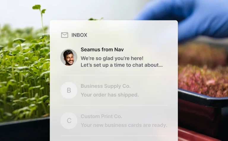 Inbox notification from Seamus at Nav welcoming a new member, displayed over a microgreens background.