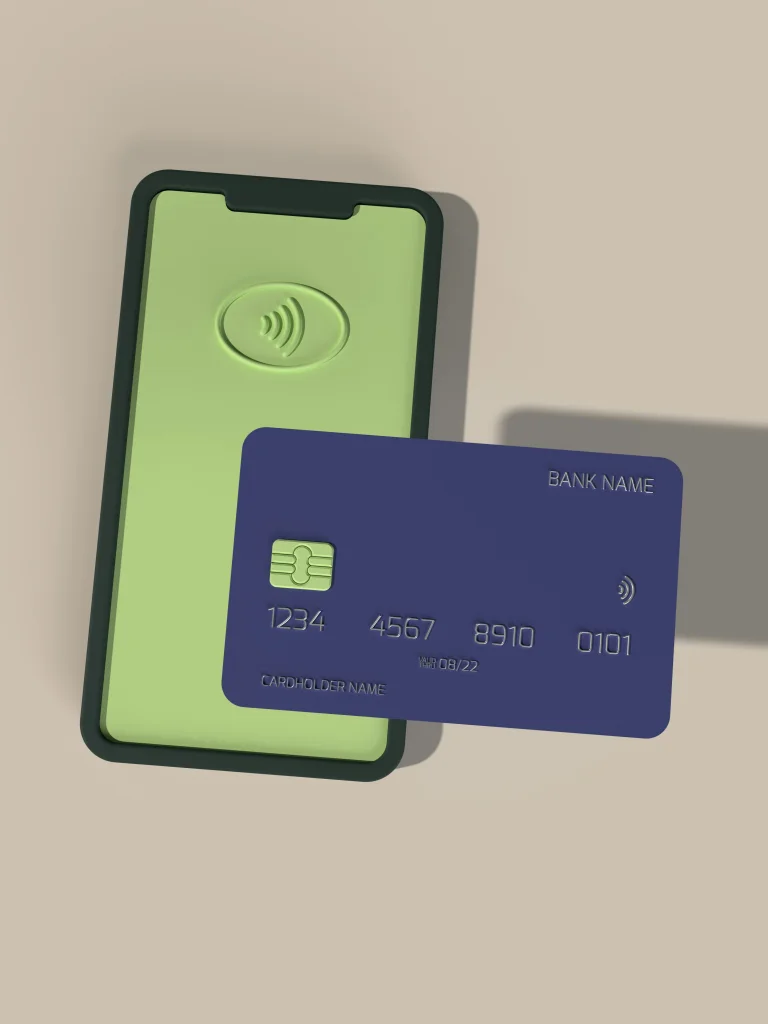 A blue credit card against a green phone screen accepting payment
