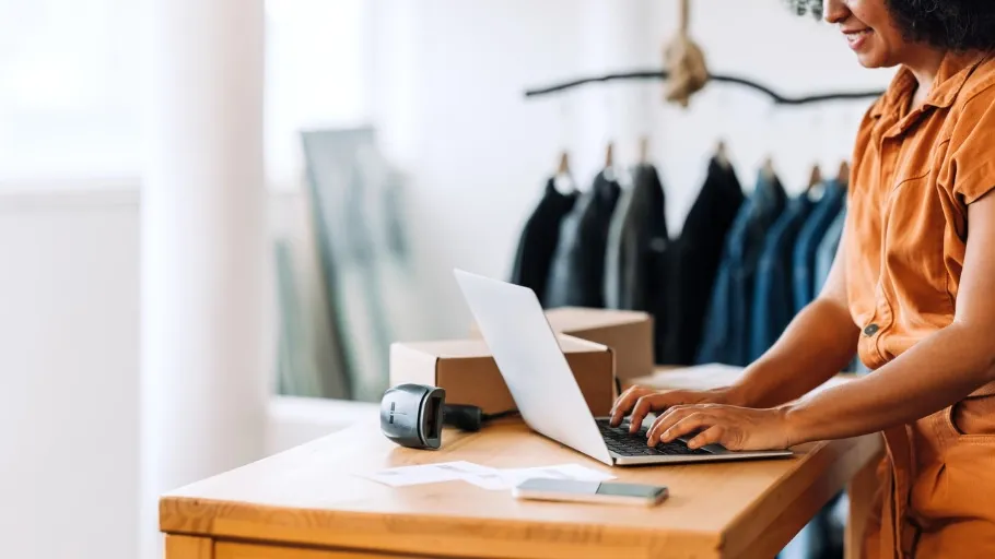 Small business owner manages payroll records.