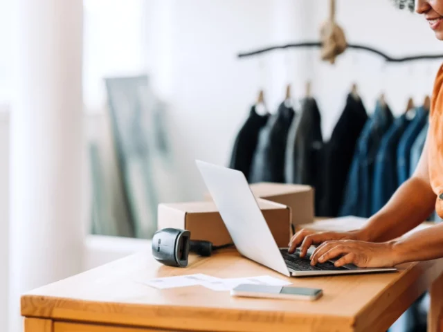 Small business owner manages payroll records.