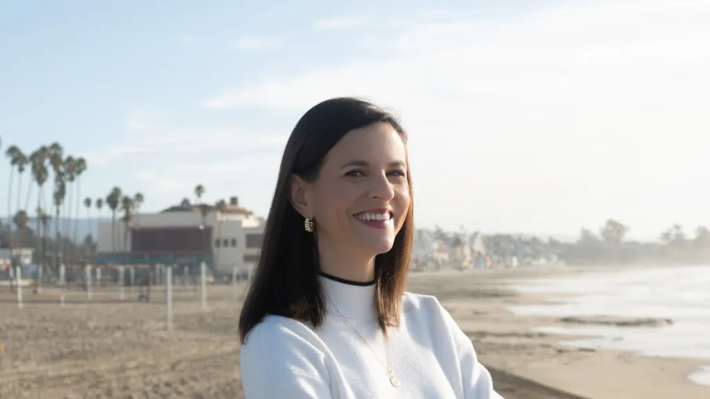 Raquel Alexander, CMO of Nav, headshot on beach