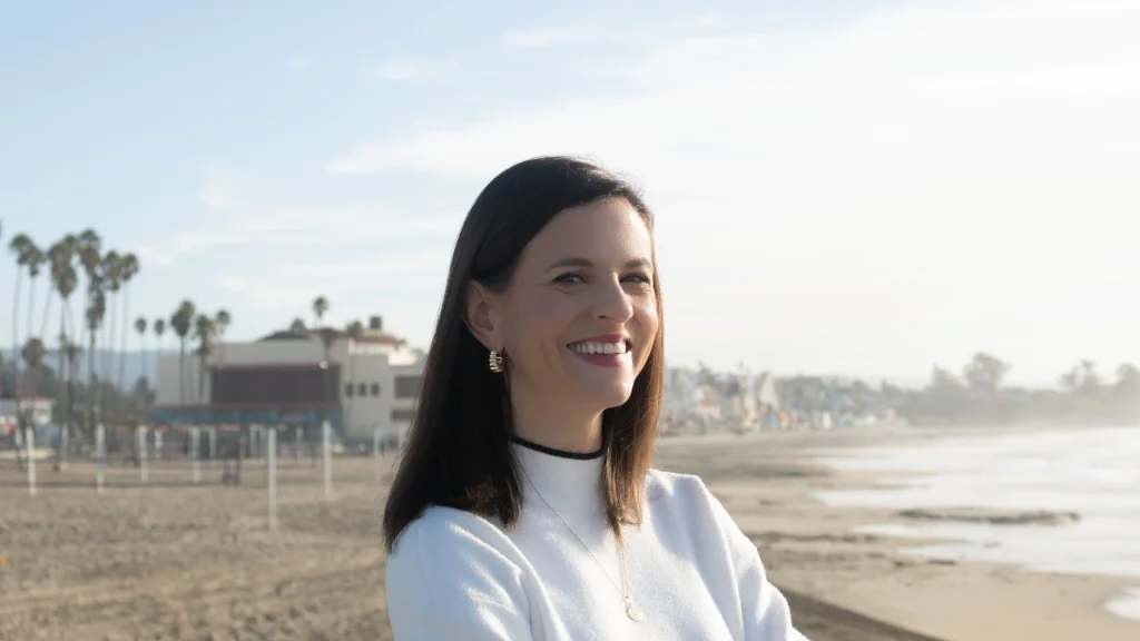 Raquel Alexander, CMO of Nav, headshot on beach