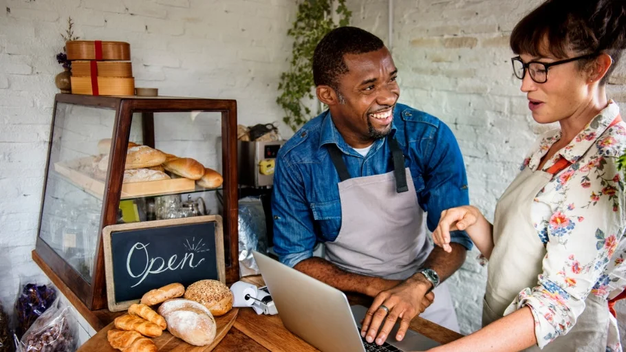 Small business owners search for business grants.