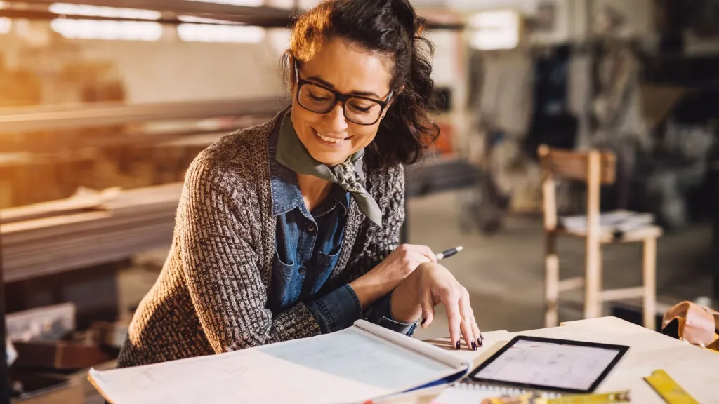 Small business owner uses small business insurance to protect their company.