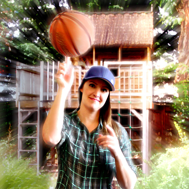 Carly spinning a basketball on her finger