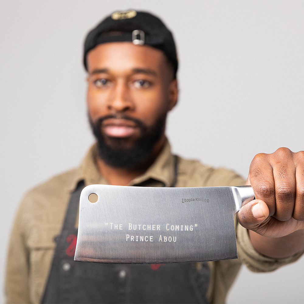 Business owner holding a meat cleaver
